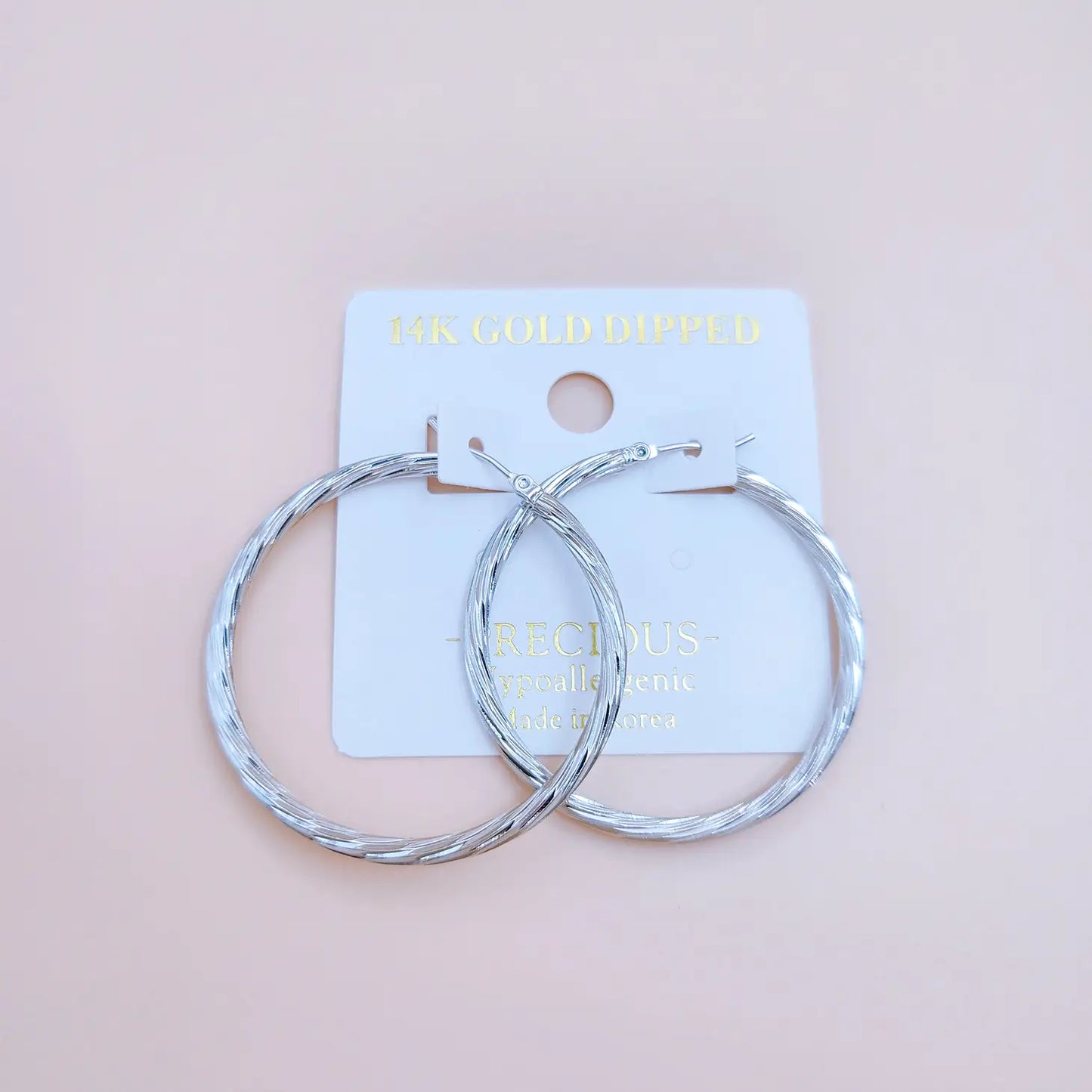 Twist the Tale Hoop Earrings